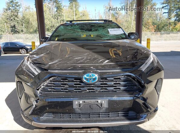 JTM16RFVXNJ016668 2022 TOYOTA RAV4 HYBRID Черный Вид задней части салона