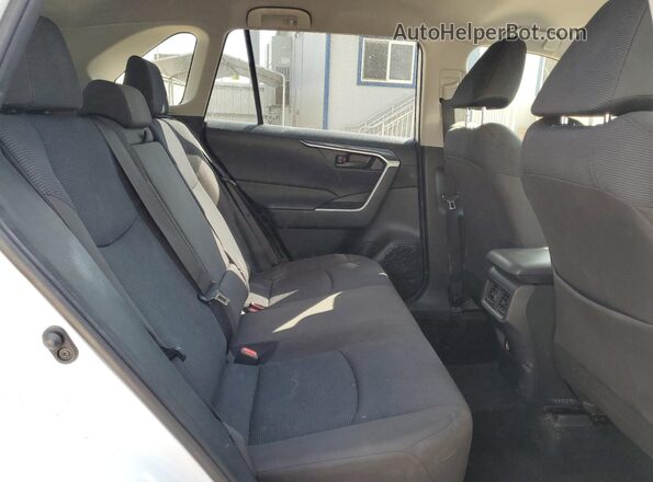 JTMK1RFV0ND093521 2022 TOYOTA LE White Вид задньої частини салону