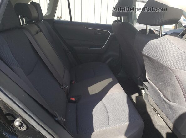 JTMK1RFV3KD038881 2019 TOYOTA LE Black Вид задньої частини салону