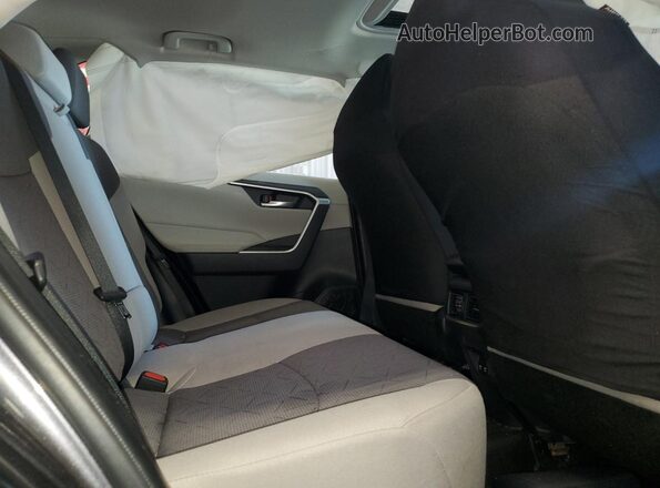 JTMP1RFV0KD047057 2019 TOYOTA LE Charcoal Widok wnętrza z tyłu
