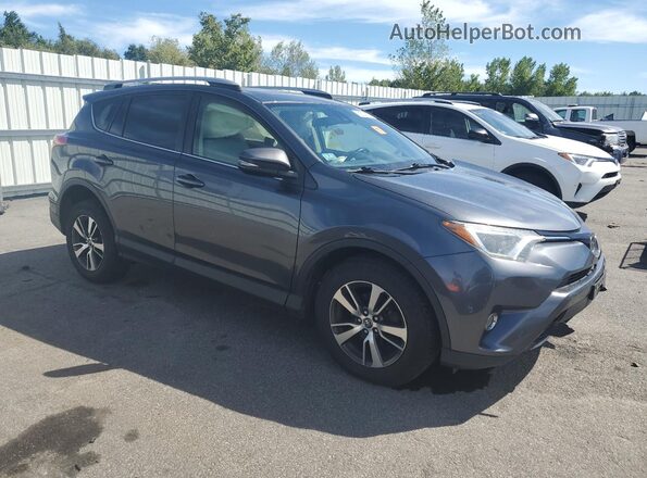 JTMRFREV6JD253025 2018 TOYOTA RAV4 Gray 