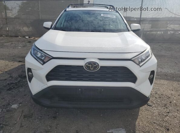 JTMW1RFV5KJ013757 2019 TOYOTA LE White Front view