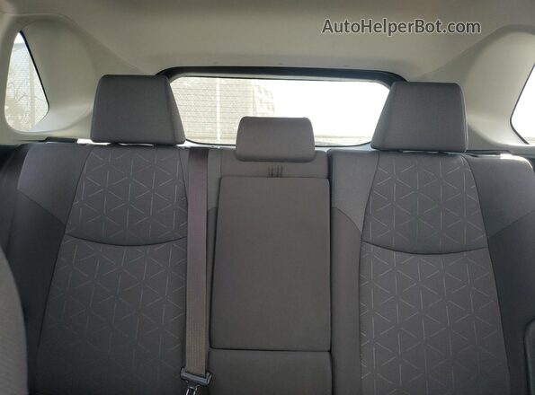JTMW1RFV5KJ013757 2019 TOYOTA LE White Rear seats view