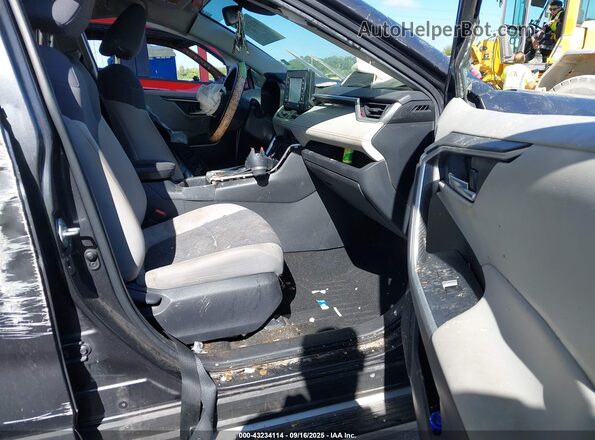 JTMW1RFV8LJ021899 2020 TOYOTA LE Black Front interior view