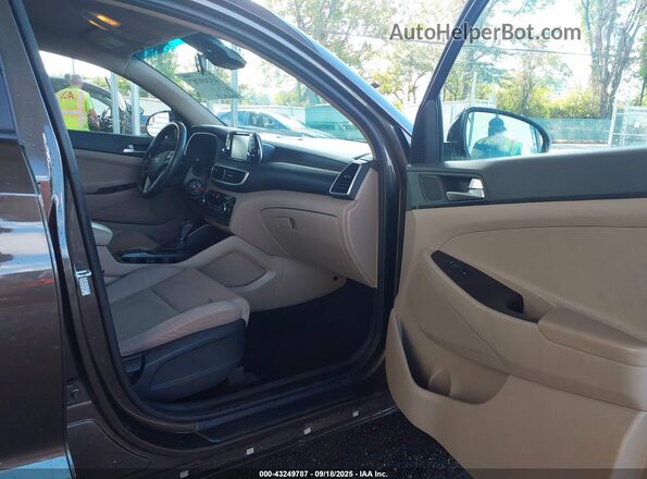KM8J23A40LU189422 2020 HYUNDAI TUCSON Brown Vista interior delantera