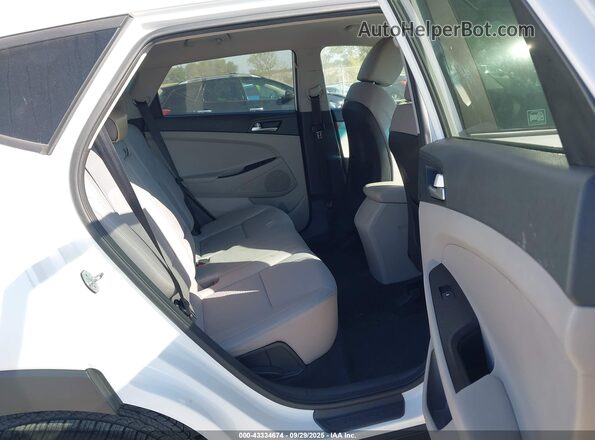 KM8J2CA41LU159538 2020 HYUNDAI TUCSON White VIN კოდის სტიკერის ხედი