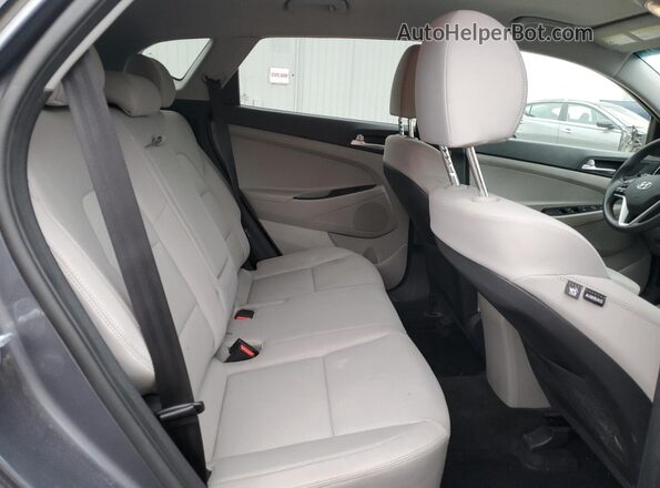 KM8J2CA42MU292004 2021 HYUNDAI TUCSON Gray Vista interior trasera