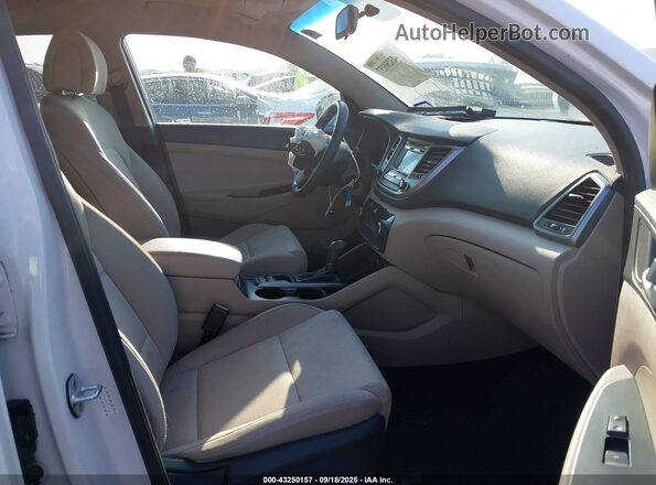 KM8J33A29GU214500 2016 HYUNDAI TUCSON White Vista interior delantera