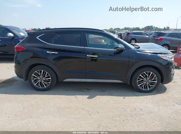KM8J33AL0MU285248 2021 HYUNDAI TUCSON Black Vista interior trasera