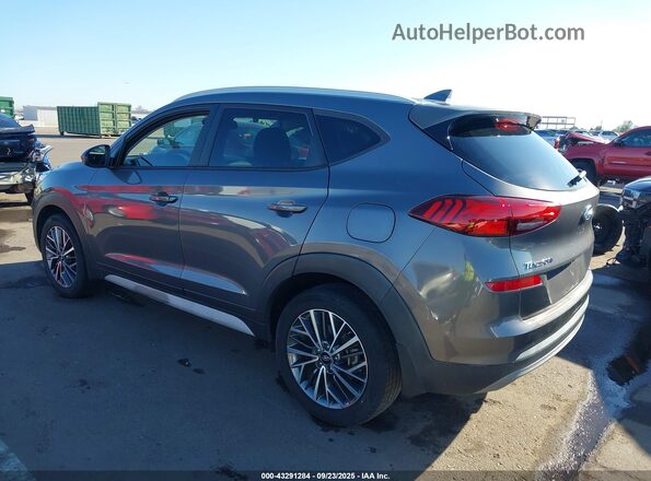 KM8J33AL5MU322472 2021 HYUNDAI TUCSON Gray Trasero izquierdo