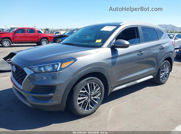 KM8J33AL5MU322472 2021 HYUNDAI TUCSON Gray Vista tres cuartos delantera izquierda