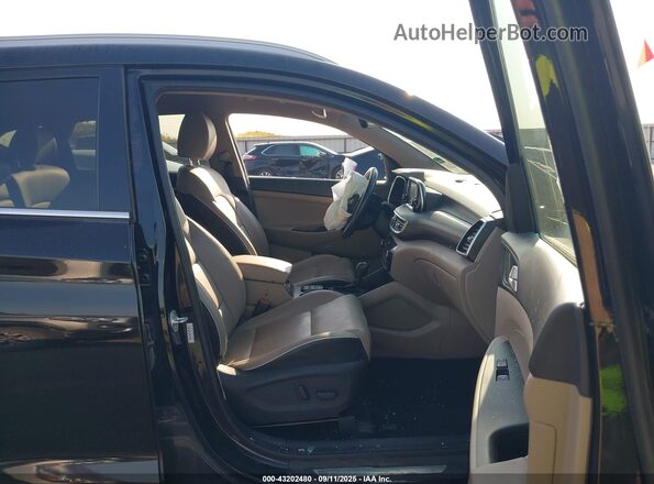 KM8J33ALXMU315596 2021 HYUNDAI TUCSON Black Front interior view