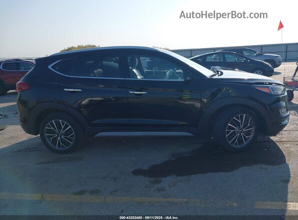 KM8J33ALXMU315596 2021 HYUNDAI TUCSON Black Rear interior view