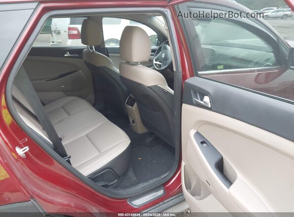 KM8J3CAL0LU268044 2020 HYUNDAI TUCSON Burgundy Vista de la etiqueta del VIN