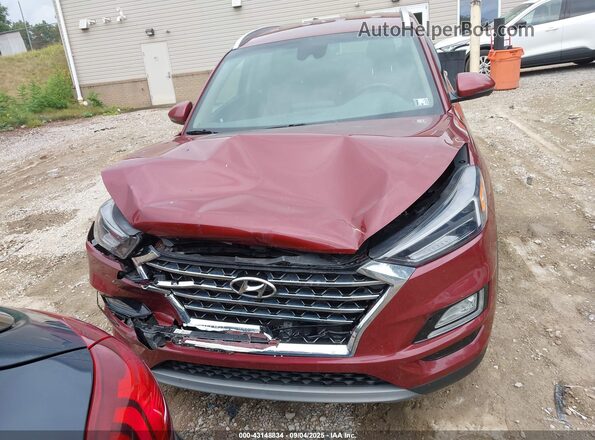 KM8J3CAL0LU268044 2020 HYUNDAI TUCSON Burgundy Vista interior trasera