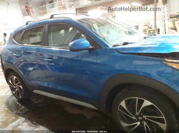 KM8J3CAL4LU206064 2020 HYUNDAI TUCSON Blue Սալոնի հետևի տեսք