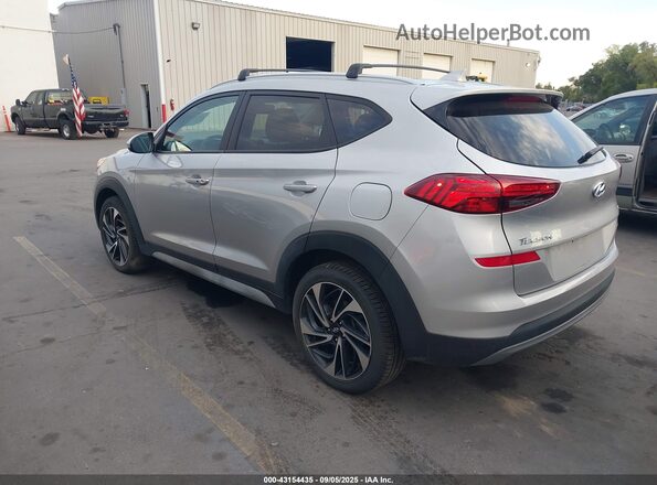 KM8J3CAL8MU314611 2021 HYUNDAI TUCSON Silver Trasero izquierdo