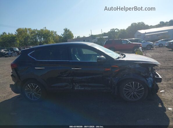 KM8J3CAL9LU078663 2020 HYUNDAI TUCSON Black Rear interior view