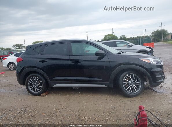 KM8J3CAL9MU341302 2021 HYUNDAI TUCSON Black Սալոնի հետևի տեսք