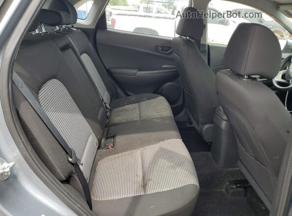 KM8K12AA8KU297860 2019 HYUNDAI KONA Gray Vista interior trasera