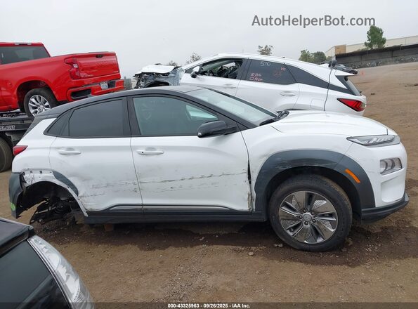 KM8K23AG2MU128573 2021 HYUNDAI KONA ELECTRIC White Widok wnętrza z tyłu