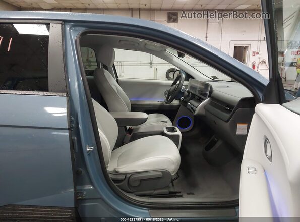 KM8KNDAF0PU139452 2023 HYUNDAI IONIQ 5 Blue Front interior view
