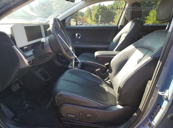 KM8KNDAF2PU207329 2023 HYUNDAI IONIQ Blue Front interior view