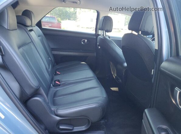 KM8KNDAF2PU207329 2023 HYUNDAI IONIQ Blue Rear seats view