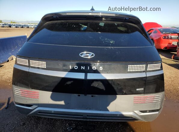 KM8KNDAF4PU208689 2023 HYUNDAI IONIQ Black უკანა ხედი