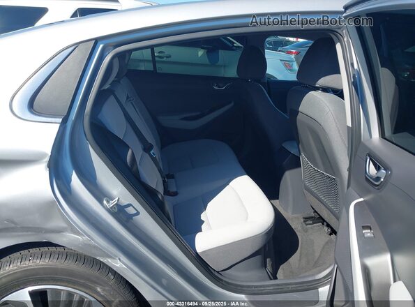KMHC75LD0NU281748 2022 HYUNDAI IONIQ PLUG-IN HYBRID Silver VIN კოდის სტიკერის ხედი
