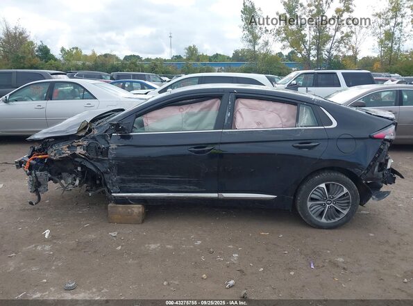 KMHC75LD1NU277823 2022 HYUNDAI IONIQ PLUG-IN HYBRID Black Вид задньої частини салону