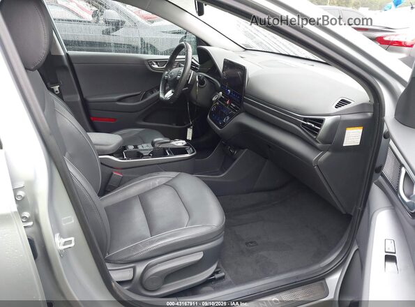 KMHC85LJ8MU079158 2021 HYUNDAI IONIQ ELECTRIC Silver Front interior view