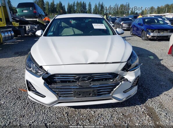 KMHE24L30KA091826 2019 HYUNDAI SONATA HYBRID White ხელსაწყოთა პანელის ხედი