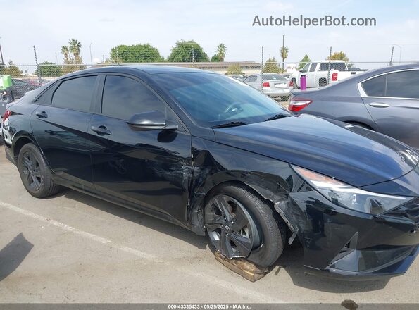 KMHLM4AJ2PU037596 2023 HYUNDAI ELANTRA HYBRID Черный Вид задней части салона