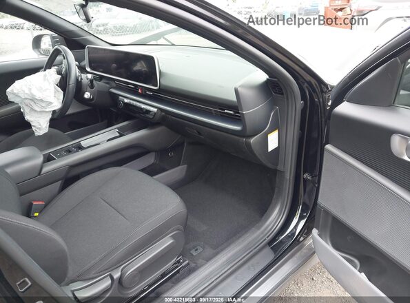 KMHM24AC9RA067002 2024 HYUNDAI IONIQ 6 Black Front interior view