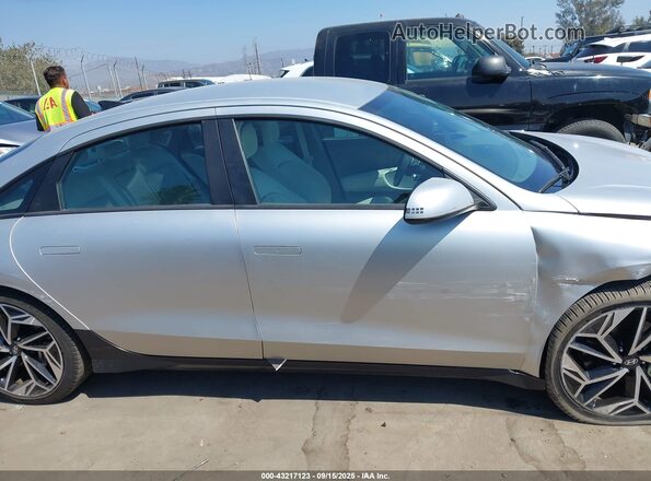 KMHM34AA7RA057399 2024 HYUNDAI IONIQ 6 Silver Vista interior trasera