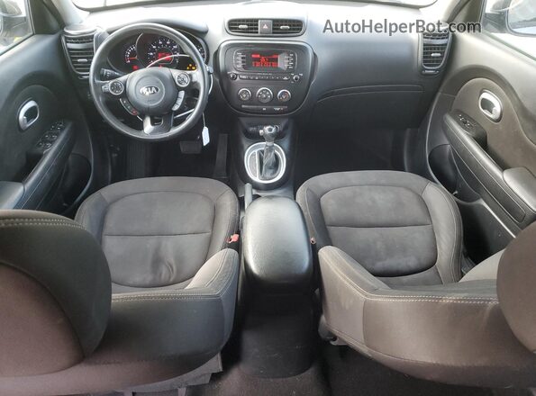 KNDJN2A2XG7374084 2016 KIA SOUL Серый Вид панели приборов