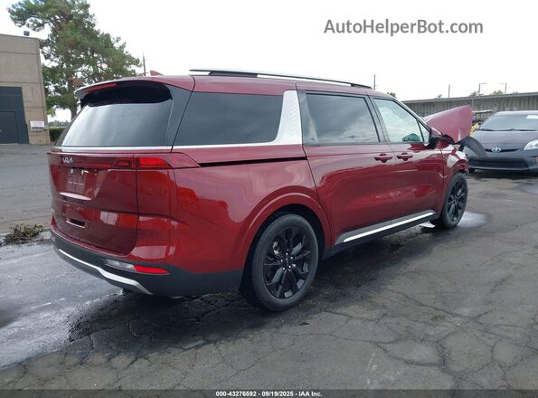KNDNE5H33P6202308 2023 KIA CARNIVAL MPV Red Trasero derecho