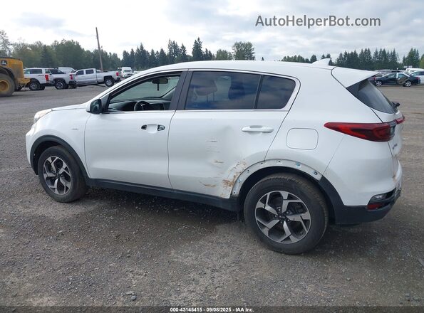 KNDPMCAC5M7942183 2021 KIA SPORTAGE White Vista interior trasera