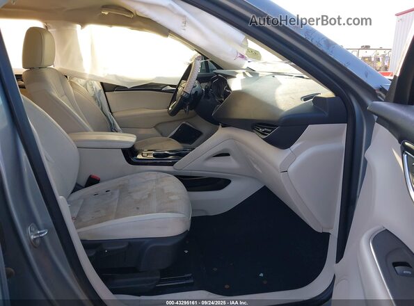 LRBAZLR45PD077305 2023 BUICK ENVISION Серебряный Вид салона спереди