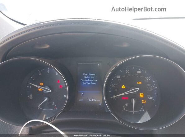 NMTKHMBX2JR027040 2018 TOYOTA LE Silver Vista de los asientos traseros