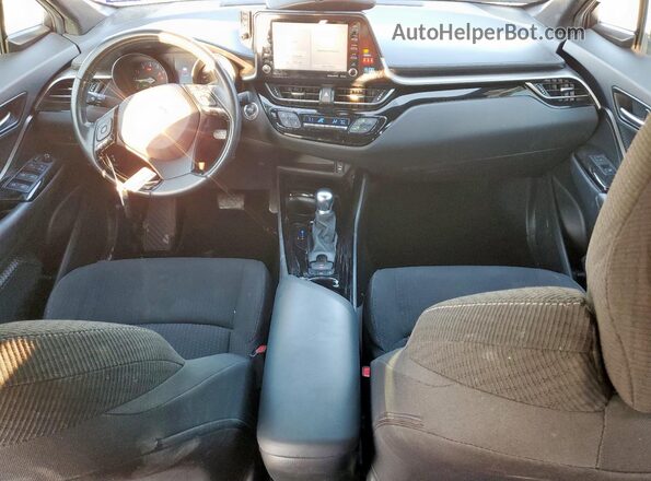 NMTKHMBX2KR090589 2019 TOYOTA LE White Dashboard view