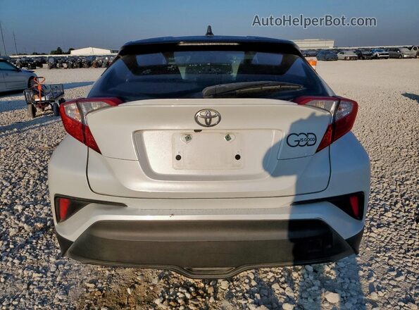 NMTKHMBX2KR090589 2019 TOYOTA LE White Rear view