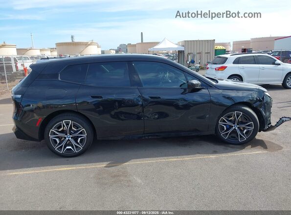 WB523CF07RCN39005 2024 BMW IX Black Widok wnętrza z tyłu