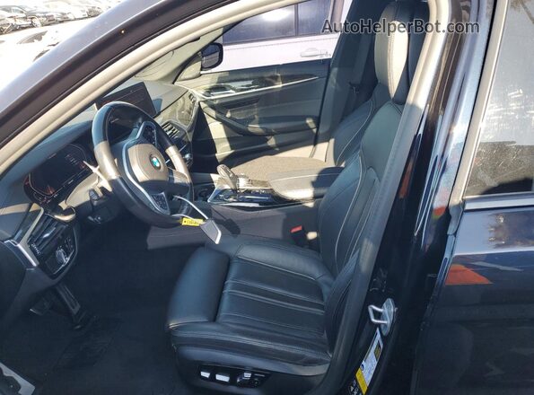 WBA13BK05MCF75185 2021 BMW M5 Black Vista interior delantera