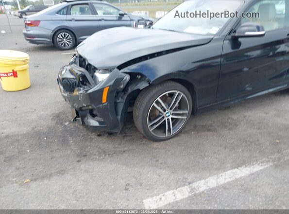 WBA2J3C09L7E65553 2020 BMW 2 SERIES Black Front view