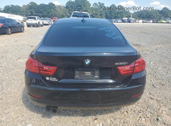 WBA4F7C52HG437725 2017 BMW 4 SERIES Black უკანა ხედი