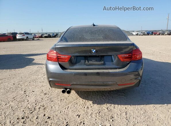 WBA4F7C53HG786070 2017 BMW 4 SERIES Charcoal Rear view
