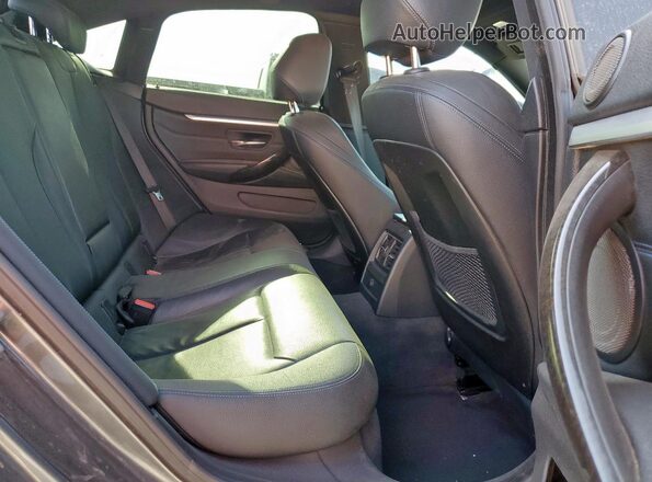 WBA4F7C53HG786070 2017 BMW 4 SERIES Charcoal Rear seats view