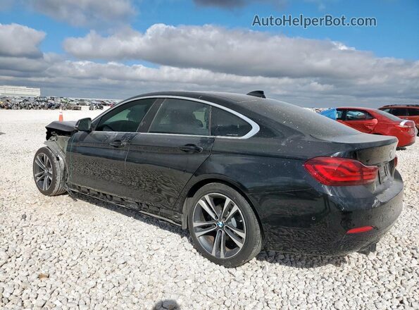 WBA4J1C05LCE20467 2020 BMW 4 SERIES Black Trasero izquierdo